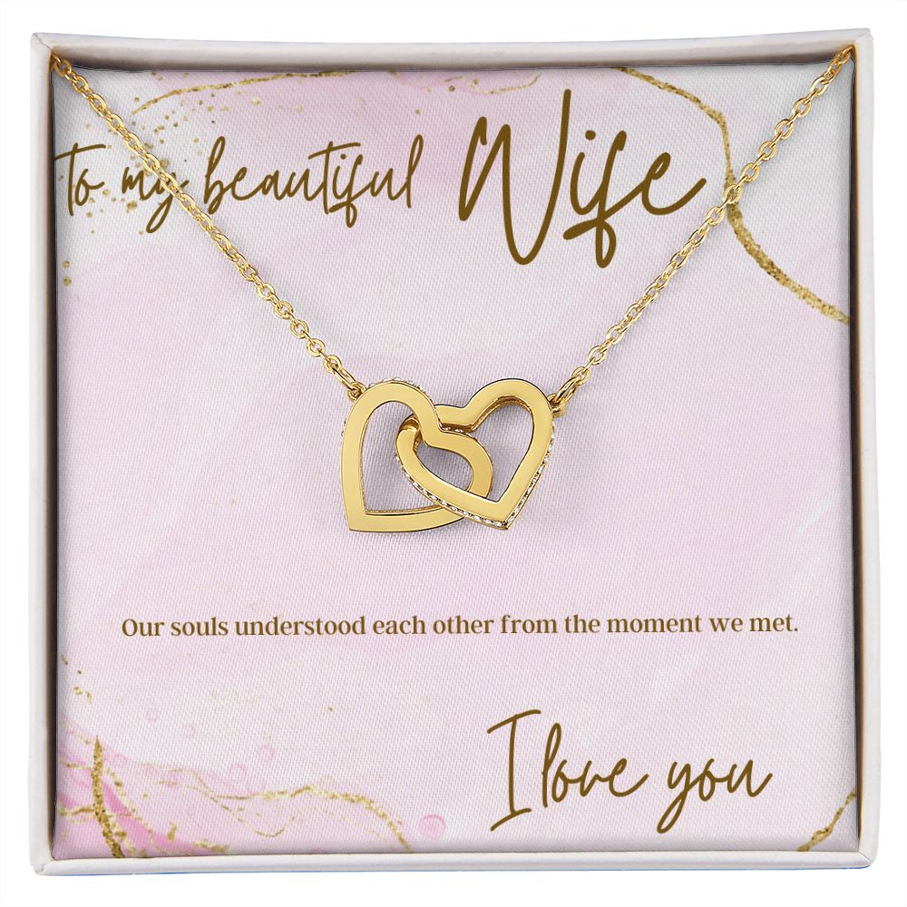 Interlocking heart necklaces