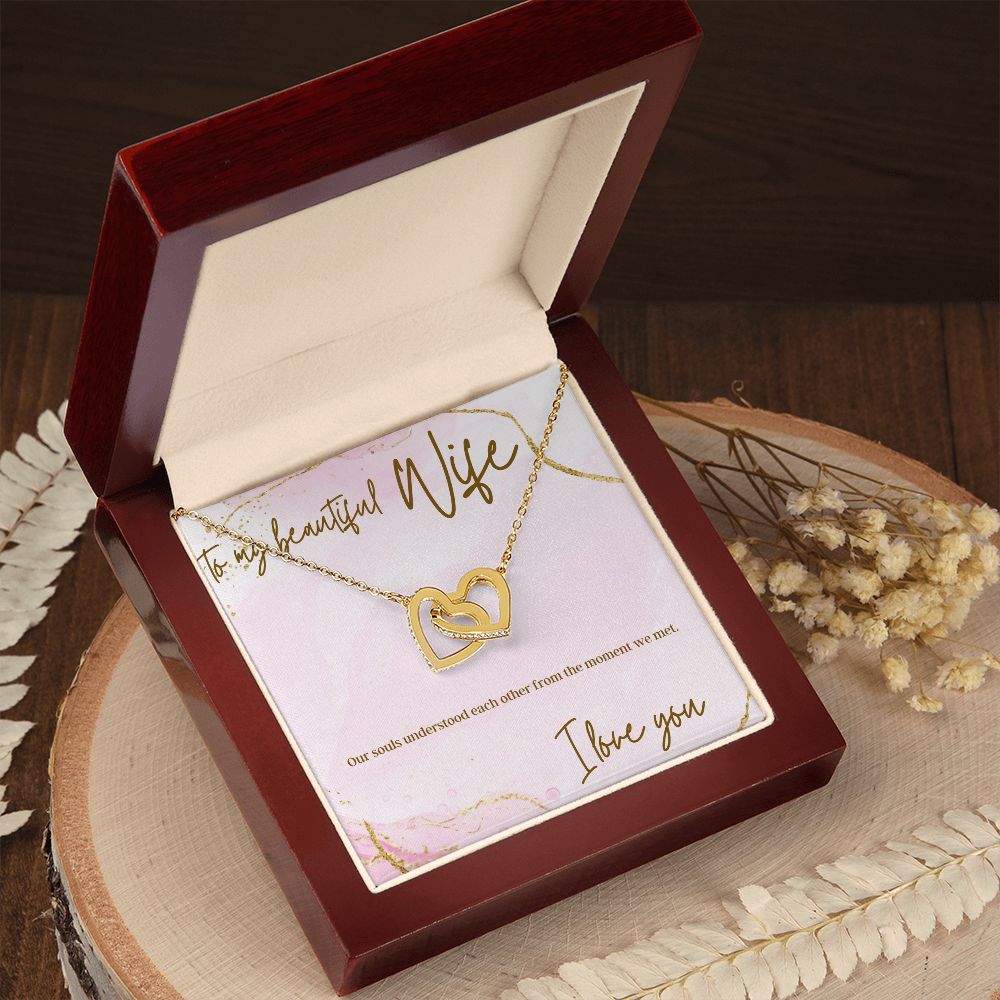 Interlocking heart necklaces