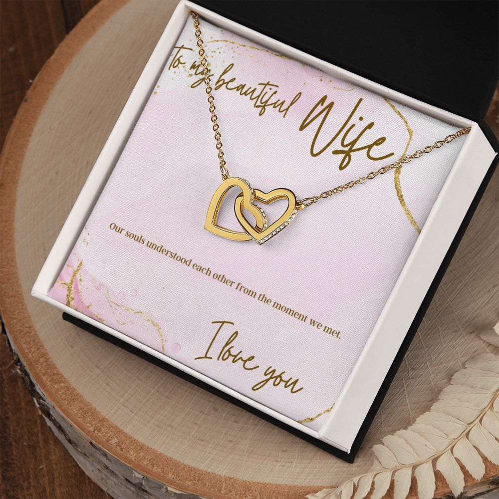 Interlocking heart necklaces